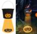 Trick or treat spand i sort med græskar-lys